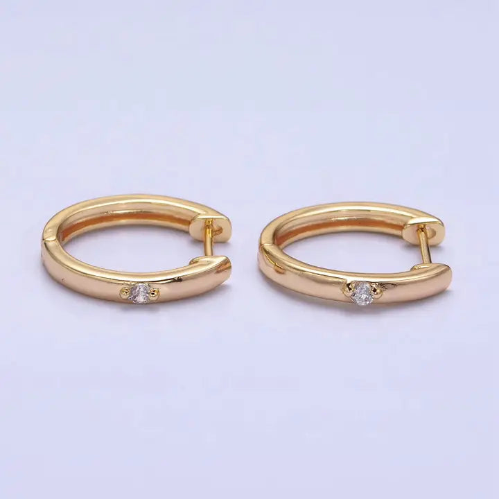Cz Dotted Oval Huggie Earrings