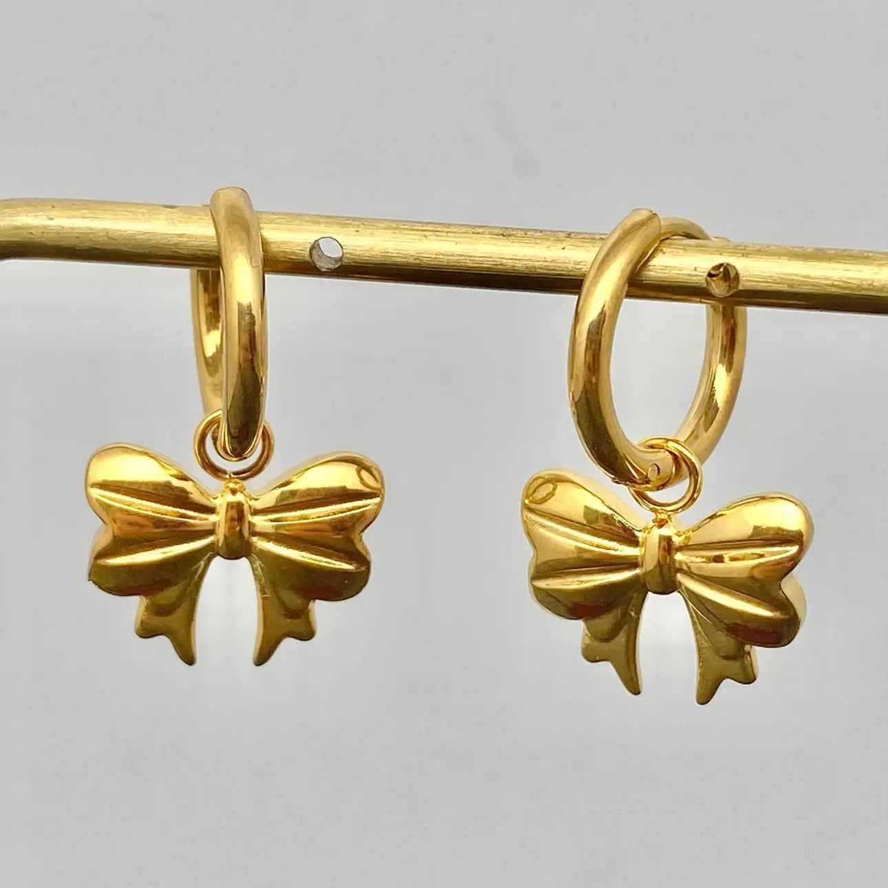 Bow Huggie Earrings